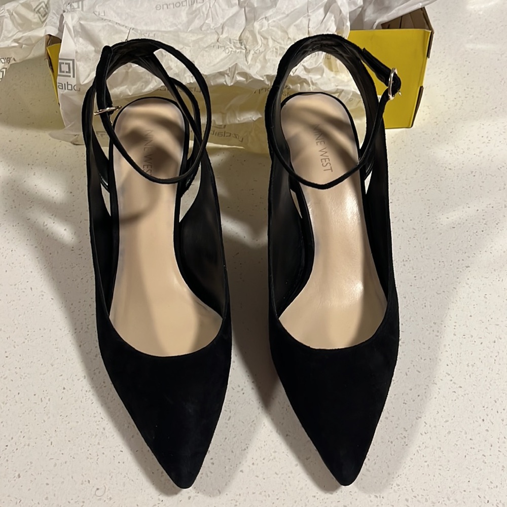 Like new - worn once or twice. Elegant thin heeled dress shoes. Size 11